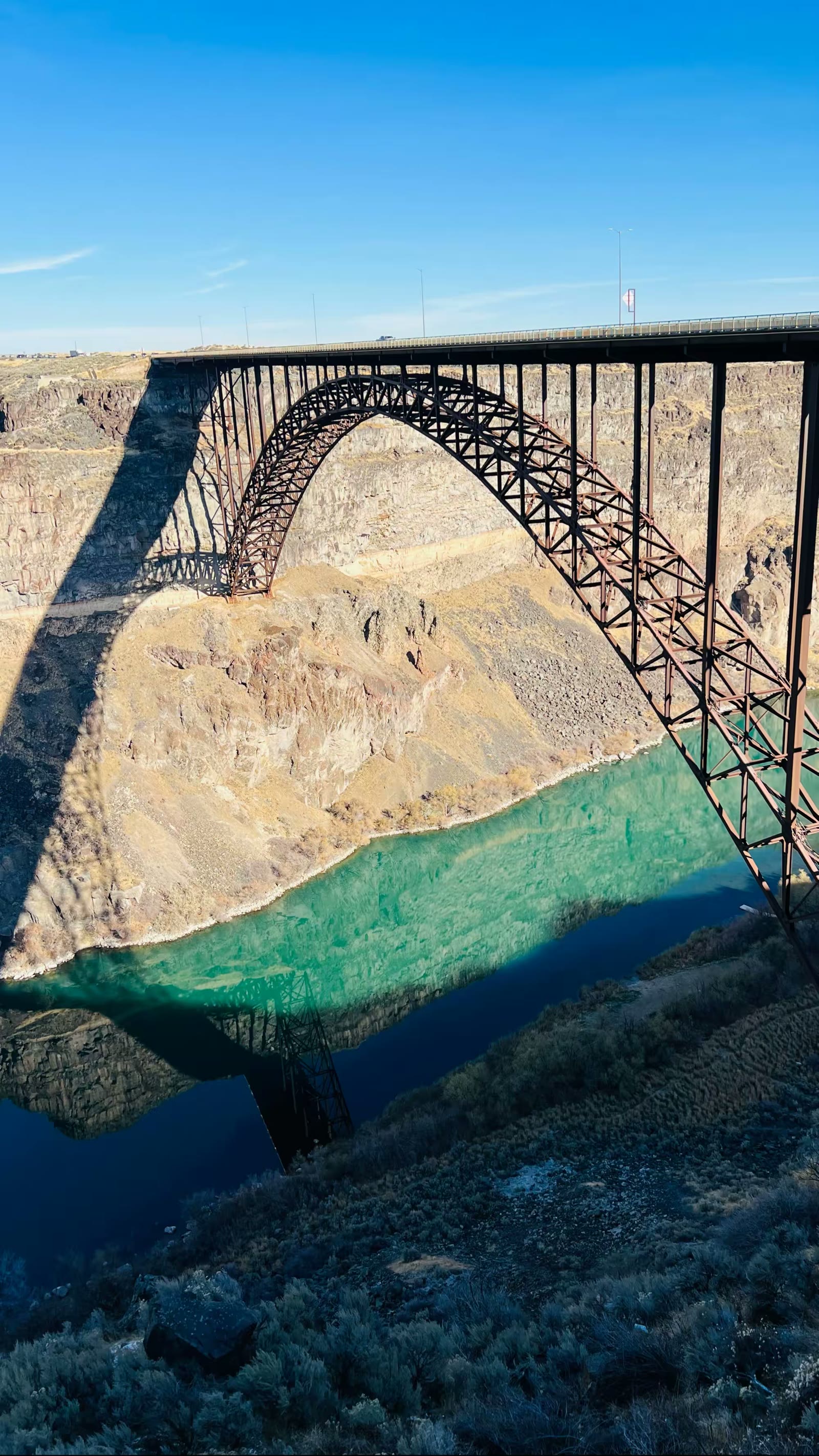 The I. B. Perrine Bridge is a four-lane truss arch span in the western United States. Located at Twin Falls, Idaho, it carries U.S. Highway 93 over the Snake River Canyon, connecting to Jerome County and Interstate 84.